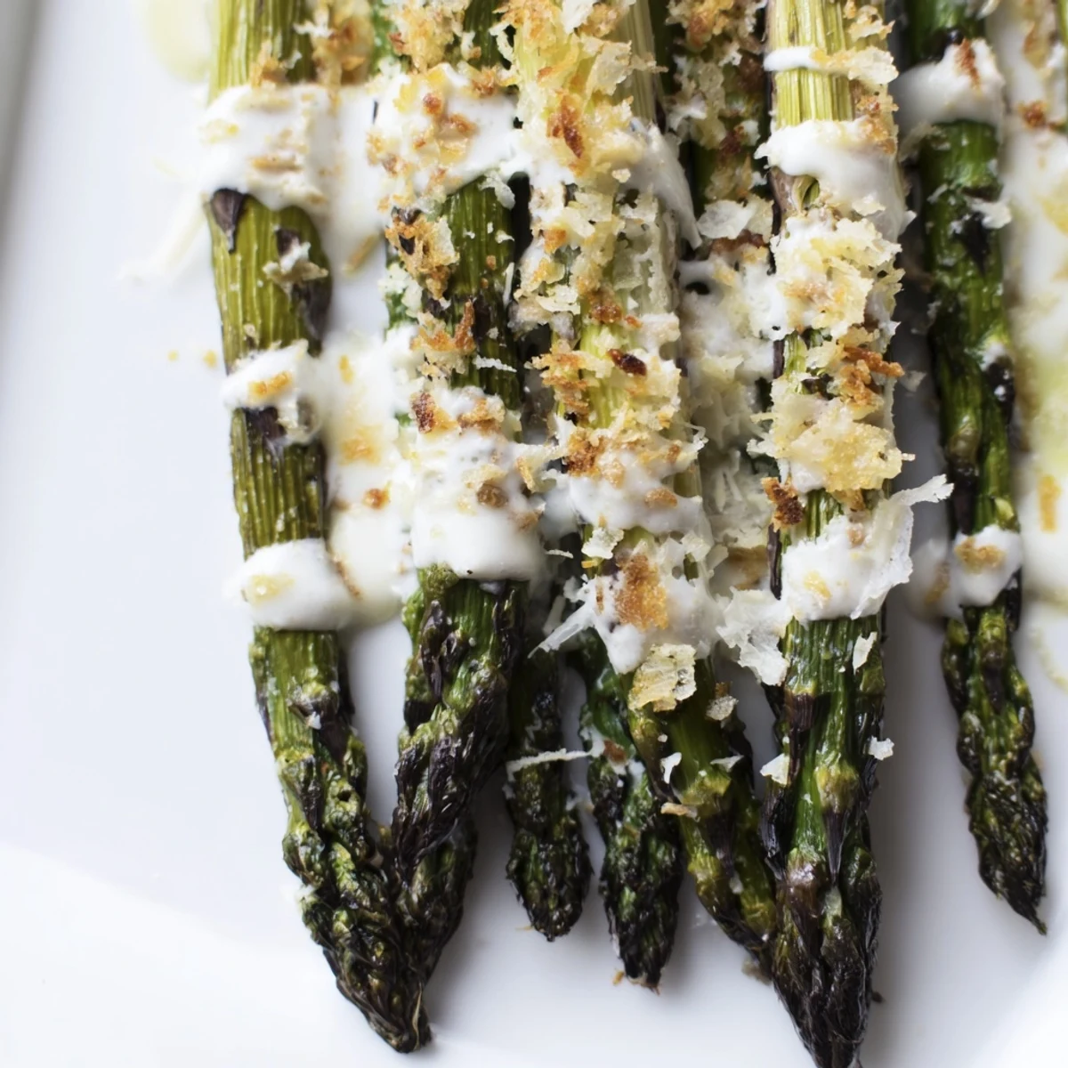 Roasted asparagus Caesar salad with charred spears and crisp romaine, topped with crunchy croutons and Parmesan.