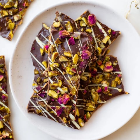 Close-up of Pistachio Dubai Chocolate Bark: layers of dark chocolate, crunchy pistachios, and crisp phyllo.
