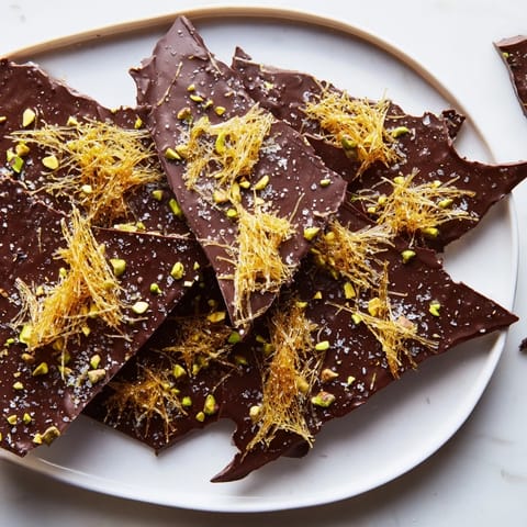 Imagine deliciously crunchy Kataifi Chocolate Crunch Bark, a fusion dessert in rich dark chocolate.