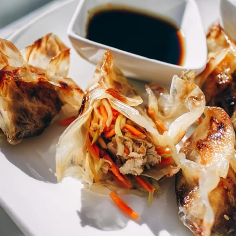 Crispy Rice Paper Dumplings filled with vegetables, perfect for dipping and enjoying.